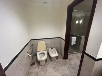 a bathroom with a toilet and a shower at Times square at suite kl in Kuala Lumpur