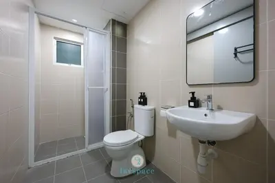 a bathroom with a toilet and a sink and a mirror at Instaworthy 2B2B - 6 pax - F&B & Mart - Chan Sow Lin in Kuala Lumpur