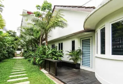 a house with a courtyard with palm trees at 68 Palms 01 l Midvalley l KL Sentral l 5 Pax in Kuala Lumpur