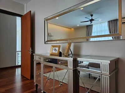 a dressing table with a large mirror in a room at Villa Homescape, Mont Kiara in Kuala Lumpur