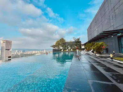 a swimming pool on the roof of a building at Dorsett Suites Kuala Lumpur By AFA in Kuala Lumpur