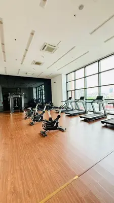 a group of people laying on the floor in a gym at Chambers Serviced Suites Kuala Lumpur in Kuala Lumpur