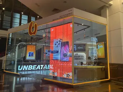 a display case for a cell phone store at Times Square by Perfect in Kuala Lumpur