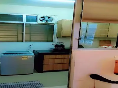 a small kitchen with a stove and a window at PV21 Luxe Comfort 3 Bedroom Modern Homestay in Prime Location near Setapak Central Mall in Kuala Lumpur