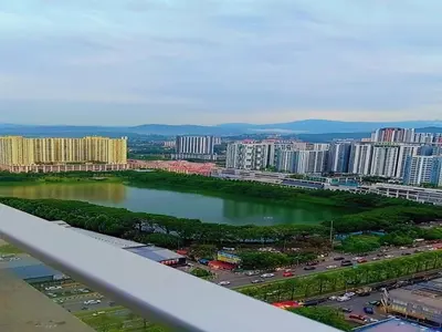 a view of a city with a river and buildings at PV21 Luxe Comfort 3 Bedroom Modern Homestay in Prime Location near Setapak Central Mall in Kuala Lumpur