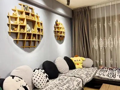 a bedroom with a bed with stuffed animals on it at Bintang Nyonya Villa-A self designed Home in Kuala Lumpur