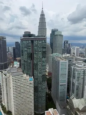 a group of tall buildings in a city at Vortex Premium Apartment klcc in Kuala Lumpur