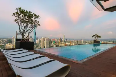a swimming pool on the roof of a building at Riveria City KL Sentral by Nest Suite in Kuala Lumpur