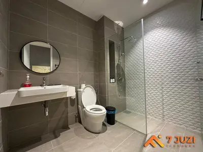 a bathroom with a toilet and a sink and a shower at Klcc Quill Cozy& Chill Suite 3-5Pax HD1080 Netflix in Kuala Lumpur