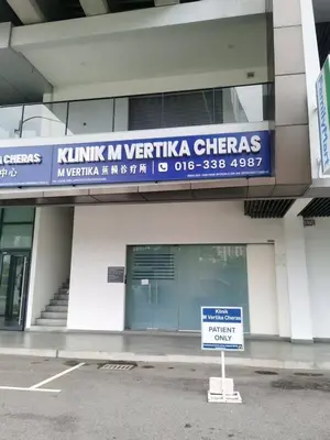 a building with a sign in front of it at ISYAK Homestay Cheras M Vertika KL in Kuala Lumpur