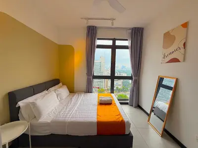 a bedroom with a bed with a window and a mirror at Neu Suites by Cozy Homes Near Gleneagles, KLCC & LRT in Kuala Lumpur