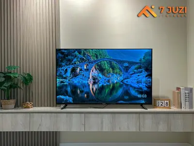 a flat screen tv sitting on top of a shelf at KL Tower View Luxury Cozy& Spacious Suite 4-5 Pax in Kuala Lumpur