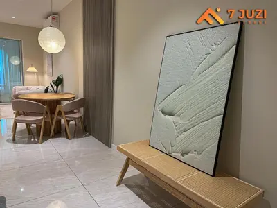 a large mirror on a wall next to a table at KL Tower View Luxury Cozy& Spacious Suite 4-5 Pax in Kuala Lumpur