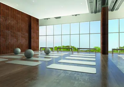 an empty room with yoga mats on the floor at Suite16 Kuala Lumpur in Kuala Lumpur