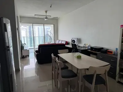a kitchen and living room with a table and chairs at Maxim City Lights in Kuala Lumpur