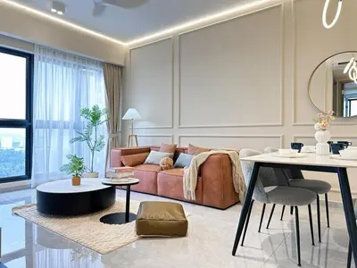 a living room with a couch and a table at Agile Bukit Bintang TRX KL by Lilbean Space - 2B1R in Kuala Lumpur