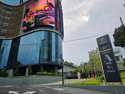 a building with a sign in front of it at MidValley Bangsar Stylish Suite by DingDing in Kuala Lumpur