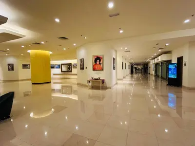 a large lobby with a large white tile floor at DYNAMIC SUITES by TIMES SQUARE KL in Kuala Lumpur