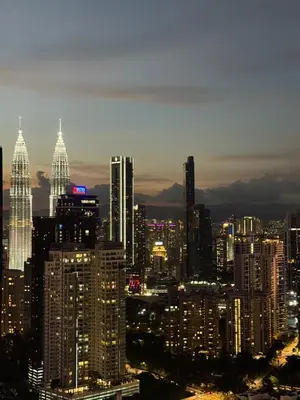 a view of a city skyline at night at Agile Delima Luxury suite Bukit Bintang in Kuala Lumpur