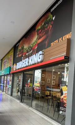 a burger king sign on the side of a store at MCity Studio With Balcony, Near KLCC, Gleneagles Hosp, Ampang Puteri Hosp in Kuala Lumpur