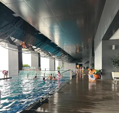 a group of people in a swimming pool at MCity Jalan Ampang 5mins KLCC, Gleneagles Hospital in Kuala Lumpur
