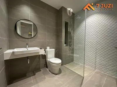 a bathroom with a toilet and a sink and a shower at Luxury and Cozy Suite KL and 118 TOWER View Netflix 1080HD in Kuala Lumpur