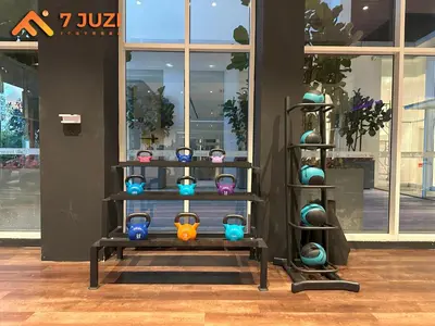 a shelf with colorful vases on it in a store at 2BED Luxury Cozy Suite 118TOWER view with NetflixHD1080 in Kuala Lumpur