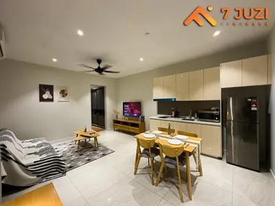 a kitchen with a table and chairs and a refrigerator at 2BED Luxury Cozy Suite 118TOWER view with NetflixHD1080 in Kuala Lumpur