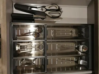 a drawer full of kitchen utensils and a pair of scissors at Velocity mall & Mytown ikea with Stunning KLCC view in Kuala Lumpur