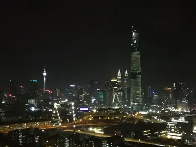 a night view of a large city with lights at Velocity mall & Mytown ikea with Stunning KLCC view in Kuala Lumpur