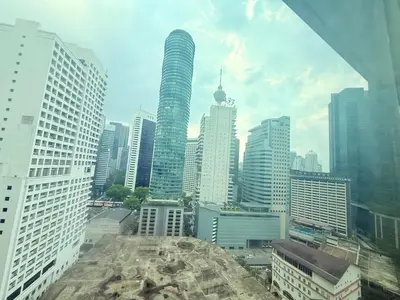 a view of a city with tall buildings at Park view Apartment near klcc in Kuala Lumpur