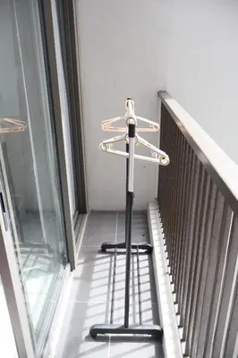 a metal stand sitting on the side of a stair case at Cozy kenwingston platz kl 2-5pax 2BR&2BR Klcc view free paikin wifi1907 in Kuala Lumpur