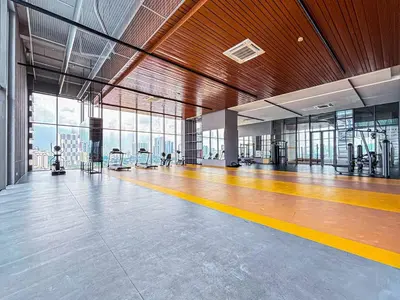 an empty gym with a gymnasium with a view of the city at Cozy kenwingston platz kl 2-5pax 2BR&2BR Klcc view free paikin wifi1907 in Kuala Lumpur