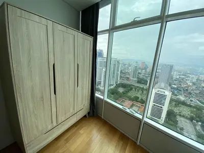 an empty room with a large window in a building at Sky Suites Luxury unit with KLCC view in Kuala Lumpur