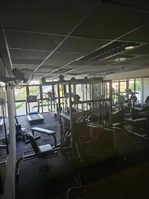 a gym with a bunch of chairs in a room at X'Apartelle near Pusat Bandar Damansara MRT in Kuala Lumpur