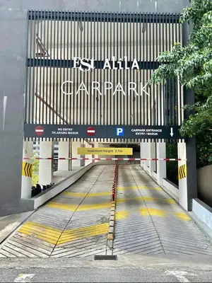 a walkway with a sign that reads santa anaanchez at KL Sentral Service Apartment-The Establishment KL Sentral EST in Kuala Lumpur