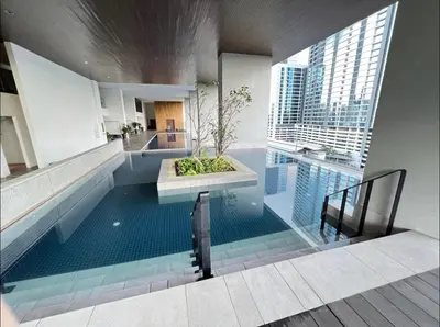 a large swimming pool in a building with a building at KL Sentral Service Apartment-The Establishment KL Sentral EST in Kuala Lumpur