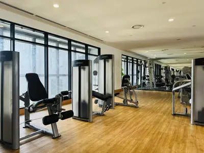 a gym with treadmills and exercise equipment in a building at KL Sentral Service Apartment-The Establishment KL Sentral EST in Kuala Lumpur