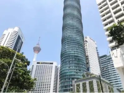 a view of a city with a tall building at Vortex KLCC by Family Suites in Kuala Lumpur