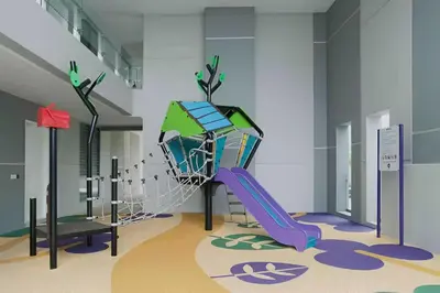 a childrens play area with a purple slide at The Robertson by Kuala Lumpur in Kuala Lumpur
