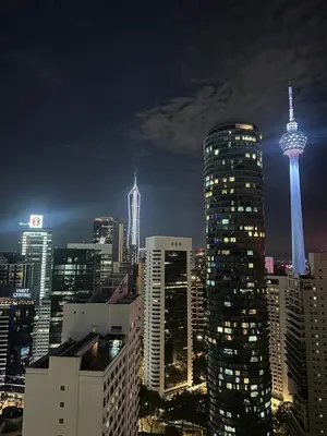 a view of a city skyline at night at Parkview 2bedroom apartment klcc in Kuala Lumpur