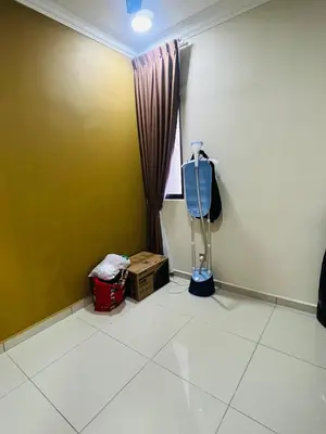 a corner of a room with a window and a floor at Vista Sentul Residence in Kuala Lumpur