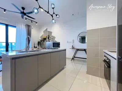 a kitchen with a sink and a counter top at Trion KL By Holidayhome in Kuala Lumpur