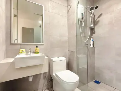 a bathroom with a toilet and a sink and a shower at Cozy Studio I Riveria City I 1km to KL Sentral in Kuala Lumpur