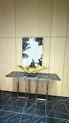a table with a yellow napkin on top of it at Majestic Alaman Suites KLCC in Kuala Lumpur
