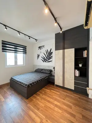 a bedroom with a bed in a room at Relax and Enjoy ! in Kuala Lumpur