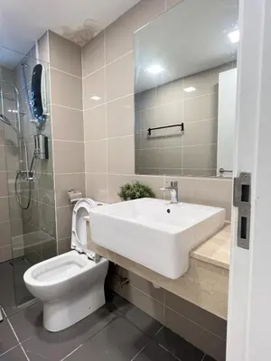 a bathroom with a sink and a toilet at Relax and Enjoy ! in Kuala Lumpur