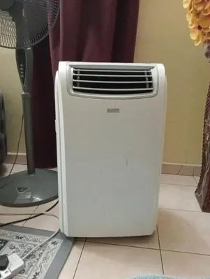 a heater sitting on the floor in a room at have fun staying here in Kuala Lumpur
