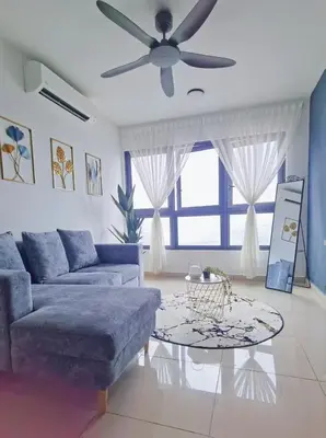 a living room with a couch and a ceiling fan at M VERTICA Isyak Homestay in Kuala Lumpur