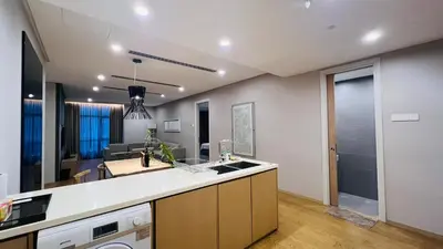 a kitchen with a sink and a counter top at KLCC Luxury 2BR 188 Suites in Kuala Lumpur